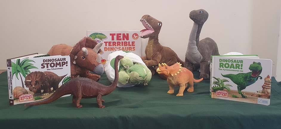 Toy dinosaurs and dinosaur books